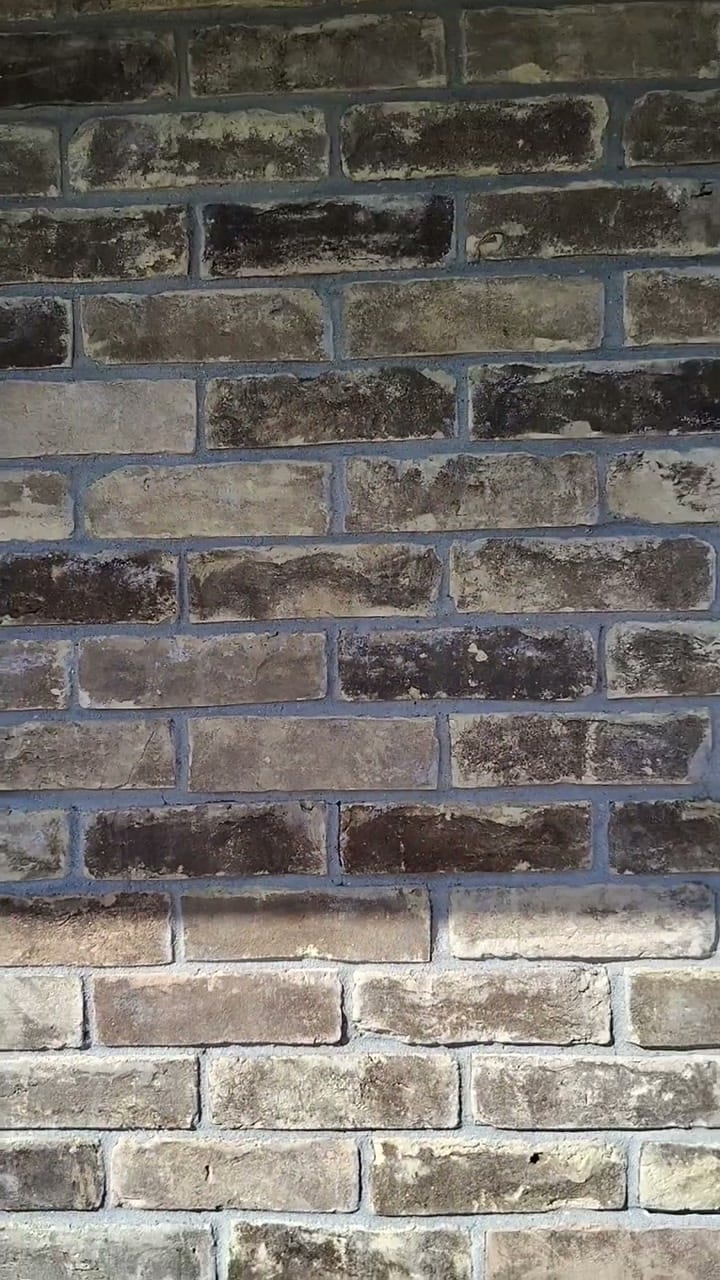 Close up of a brick wall soft rinsed by Curb Appeal, mortar and brick face clean